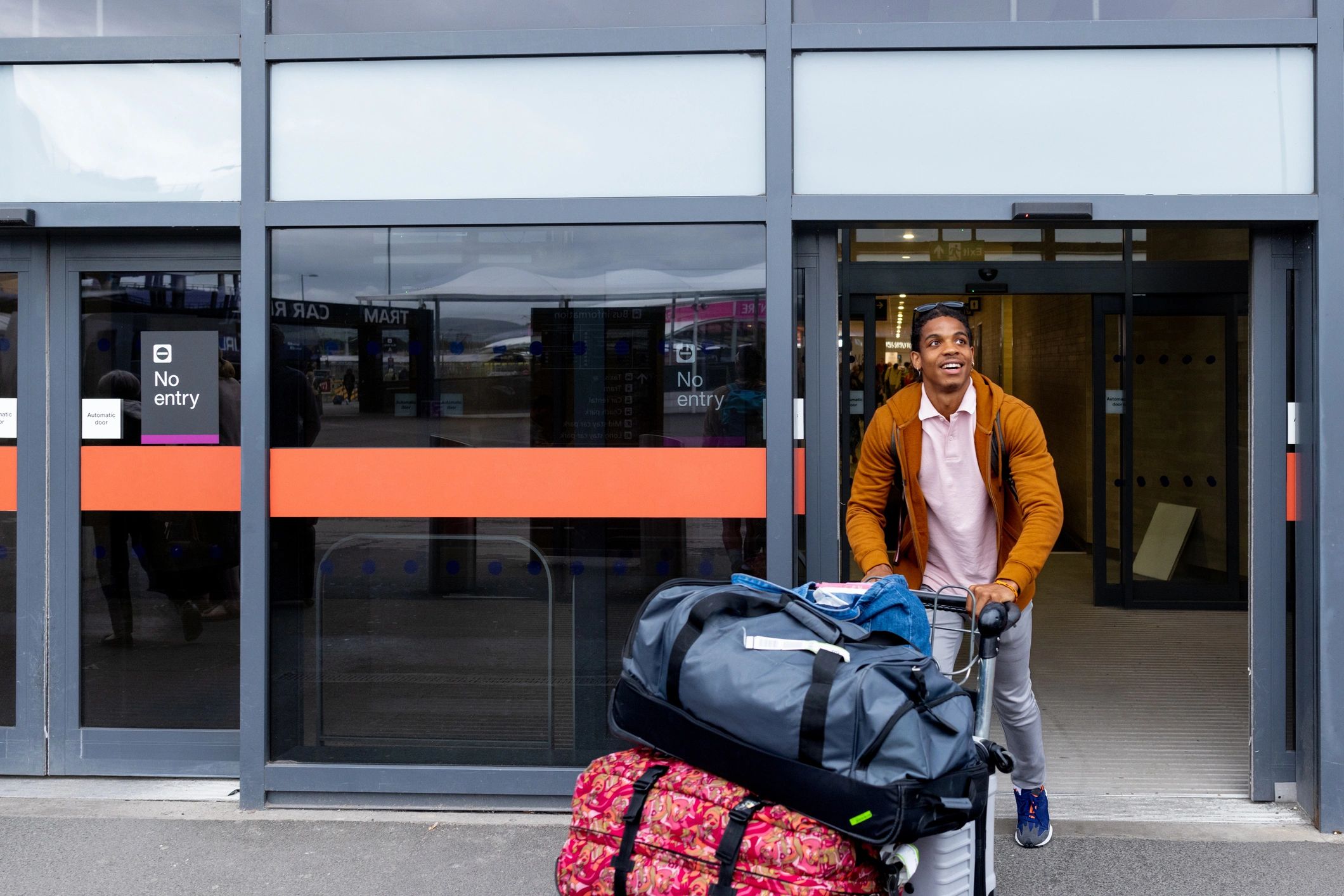 Traveler arriving at the airport with luggage