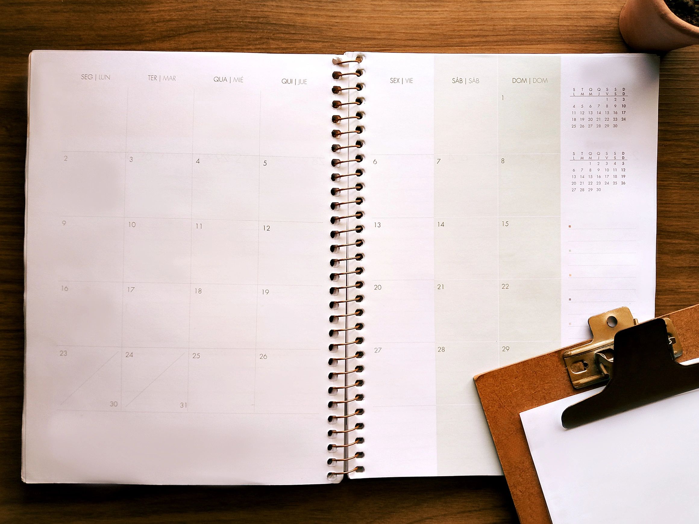 Travel planning desk with planner and clipboard